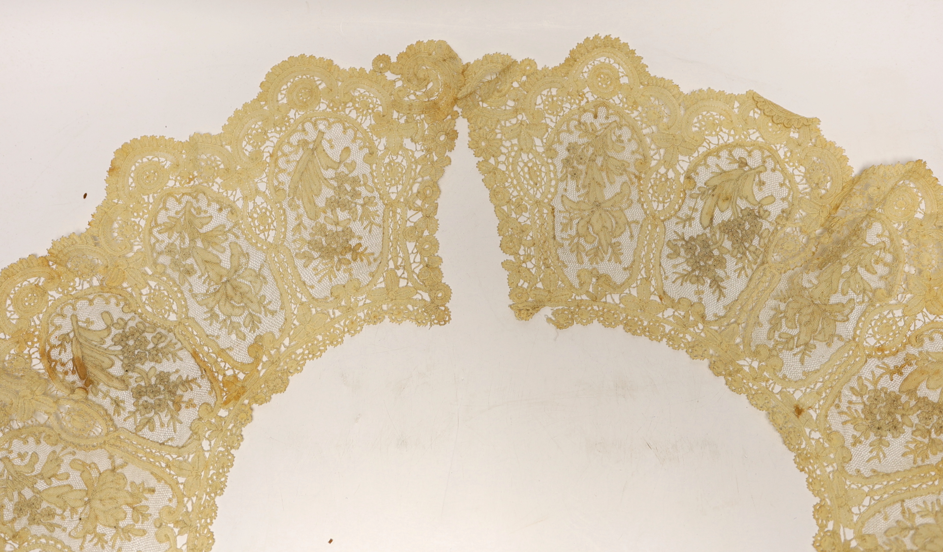A long 19th century mixed Brussels lace collar, with 20 needle lace oval insertions, a similar wider Honiton bobbin lace collar and a machine lace bonnet veil